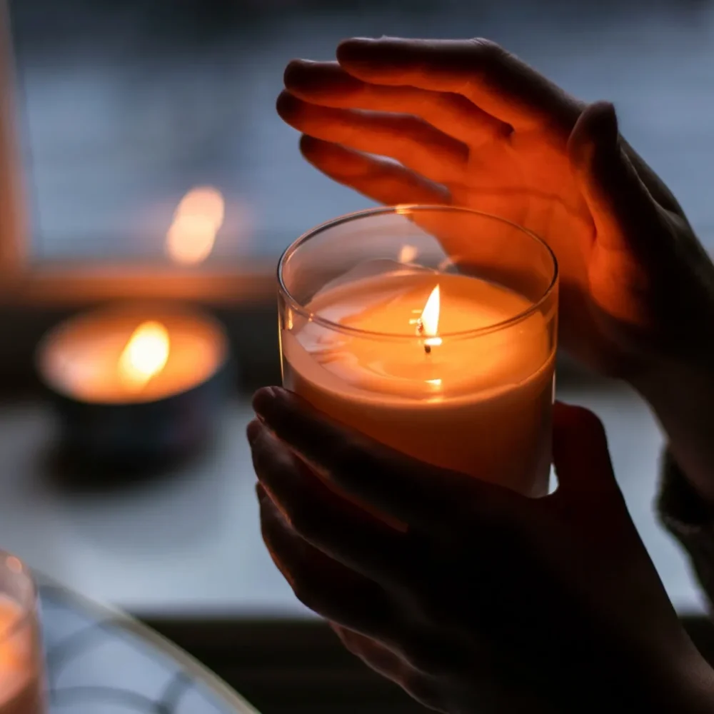 Candle and hand.jpg MUST USE ON SACRED PSYCHOL